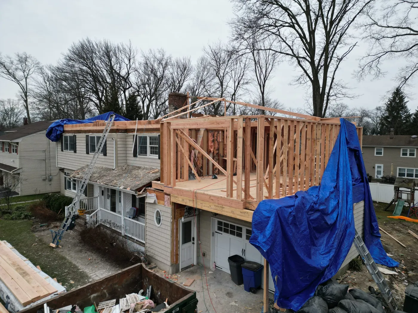 Foundation excavation transformed into framed two-story addition — after
